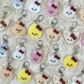 stray kids hello kitty skzoo keychains!